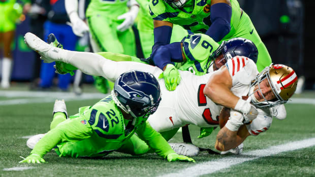 McCaffrey rushed for 114 yards and two touchdowns in the first half for the 49ers during their Thanksgiving game.